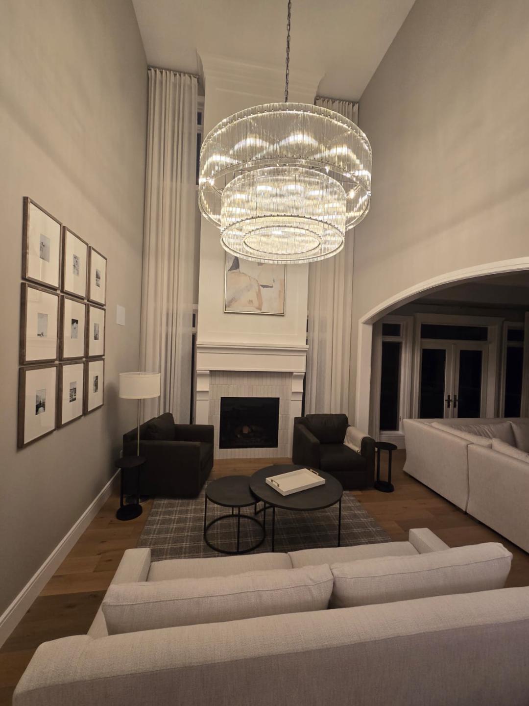 Clean lounge with chandelier after DMA Facility Care interior cleaning